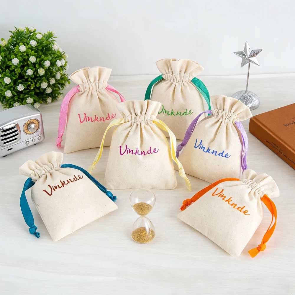 

100Pcs Personalized Logo Jewelry Drawstring Pouch Ribbon Gift Beige Natural Cotton Bag Earring Ring Cosmetic Travel Packaging