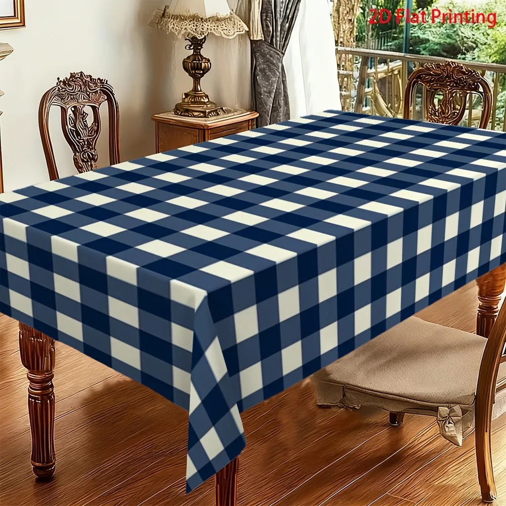 One single-sided printed multi-functional spring tablecloth, in dark blue and white check pattern.