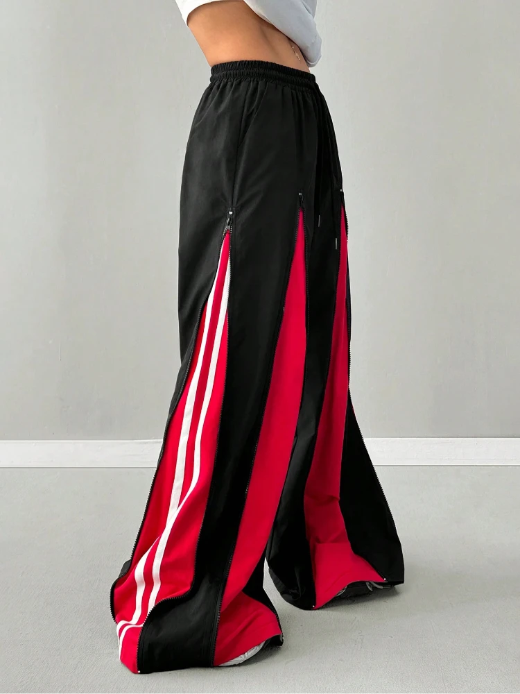 アメリカのストリート系ホットガール、カラーブロッキングトレンドファッション、原宿ヒップホップスタイル、ジッパー付きスプライシング、レトロな個性、ゆったりとしたフロアパンツ