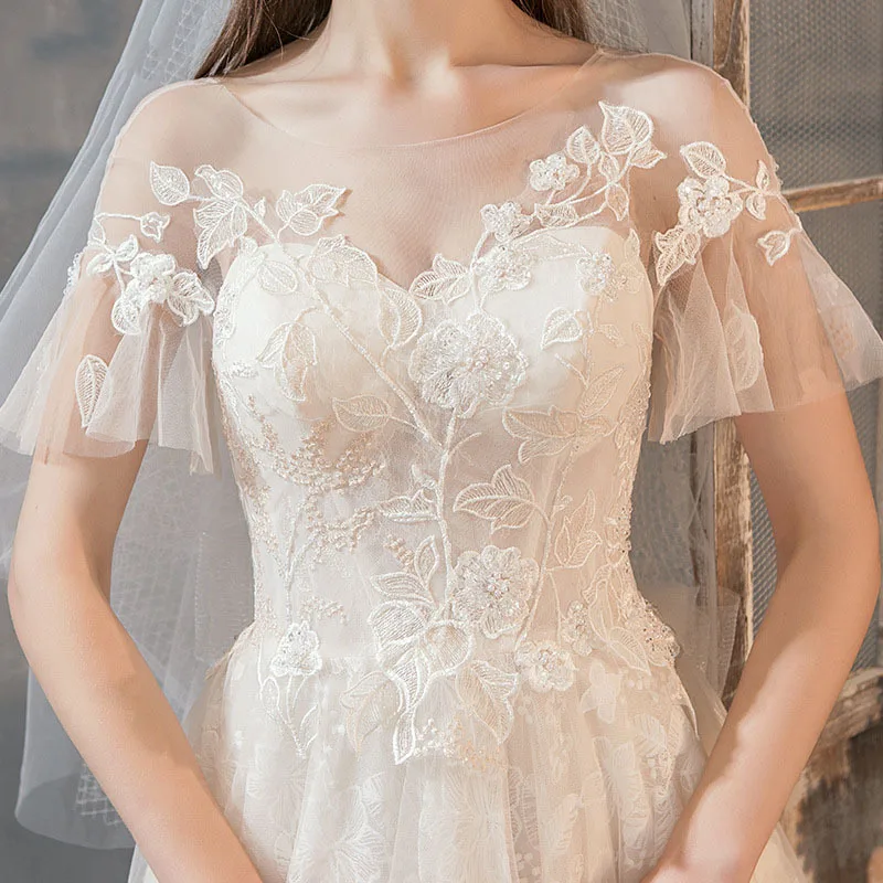 Robes de mariée à manches volantées en tulle avec appliques A-Line, quelle que soit l'élégante soirée nuptiale, quelle que soit la robe formelle, chérie du paupières