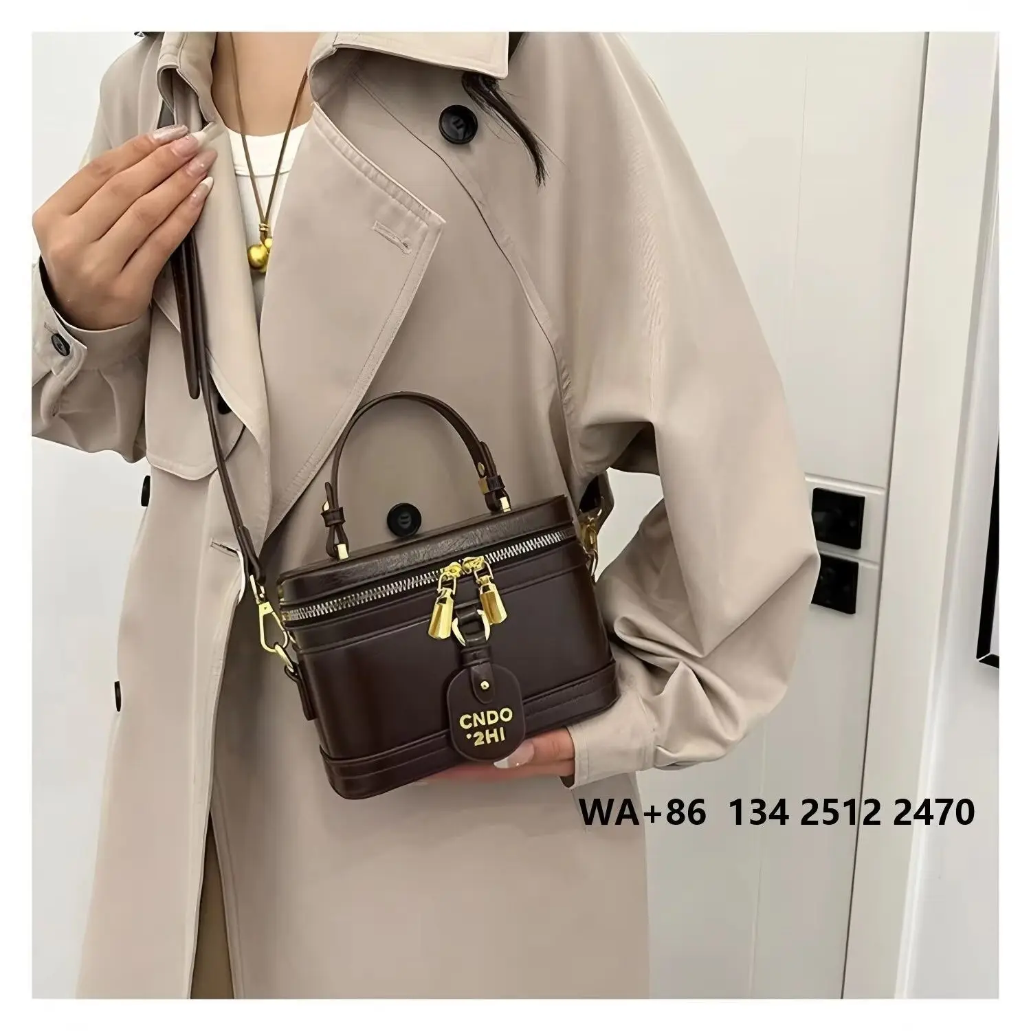 Dark brown leather mini handbag, single handle, with a detachable and adjustable crossbody strap, double zippers with lock accents, vintage ladies' shoulder bag.
