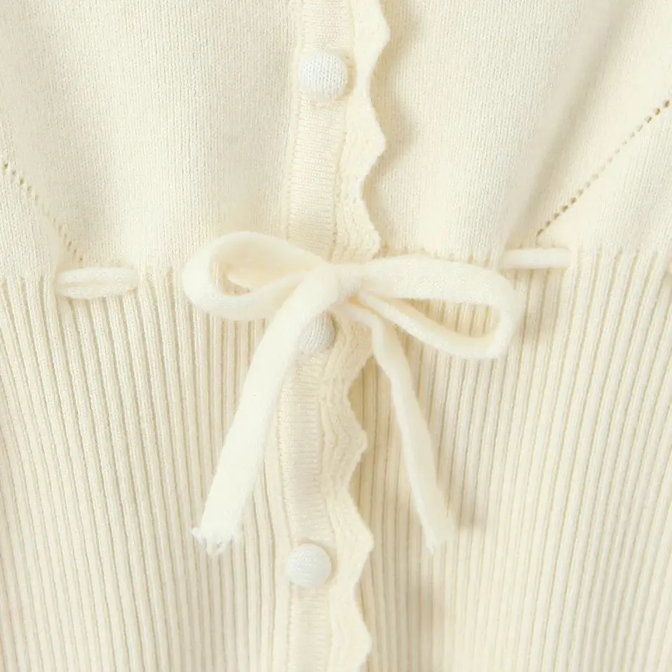 2025 شيك هول زر من خلال المحاصيل Pointelle سترة متماسكة سترة امرأة الخامس طوق القوس الخصر مضيئة كم البلوز تريكو