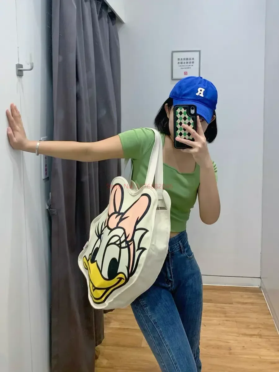 Disney Kawaii Anime Daisy Duck Canvas Cartoon borsa a tracolla per lo Shopping di grande capacità borsa portatile per ragazze di moda regali di