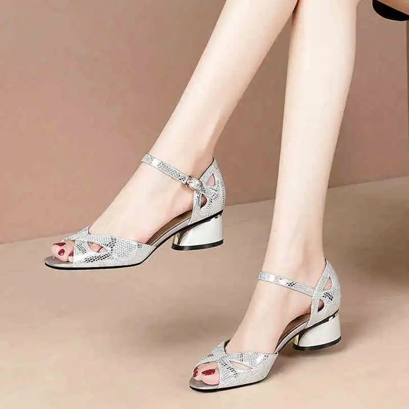 

2025 new fashion trend thick heel hollow fish mouth snake pattern women's shoes a word button sandals women