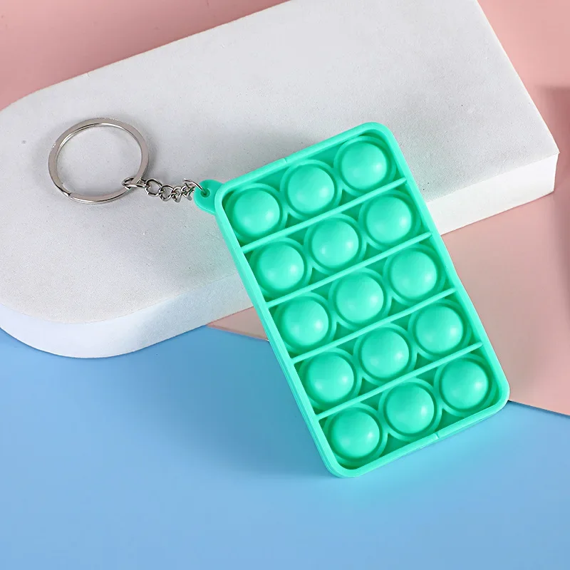ミニプッシュポップ減圧おもちゃシリコーンレインボーキーホルダーストレスリリーフおもちゃ抗ストレスコントローラ知育玩具