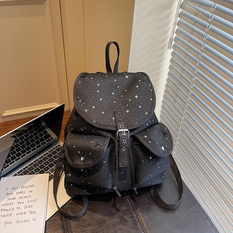 

College-style star-patterned canvas backpack for women2026New trendy fashion commuter large-capacity casual student backpack