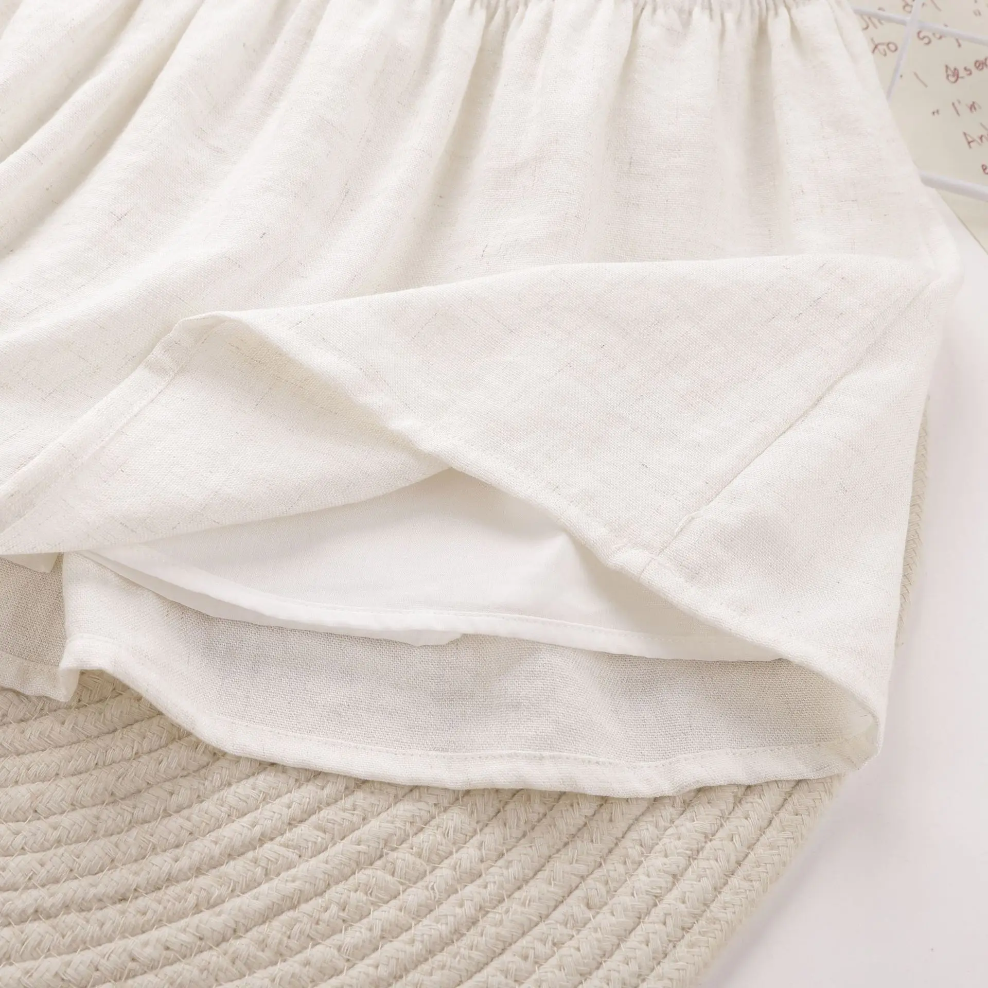 تنورة كورية متعددة الاستخدامات قابلة للتنفس وخفيفة الوزن للأطفال البنات تنورة ميدي من نسيج القطن والكتان مع فيونكة جديدة ولطيفة