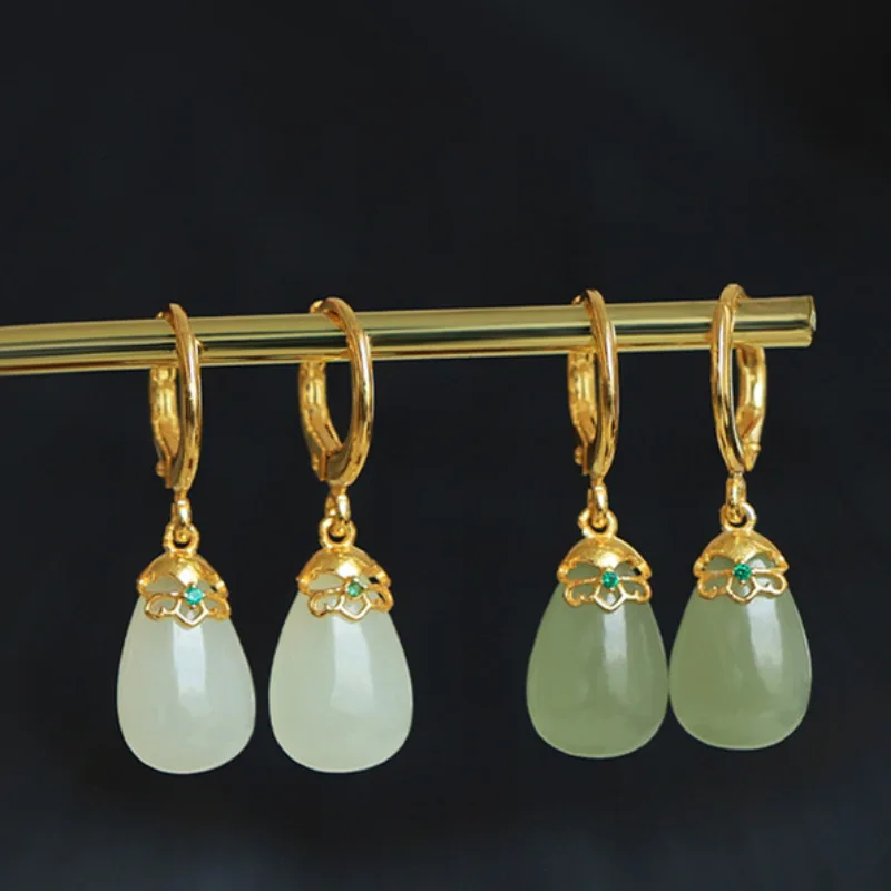 

Original natural Hetian jade fresh orchid earrings Chinese style retro unique ancient gold charm women's silver jewelry