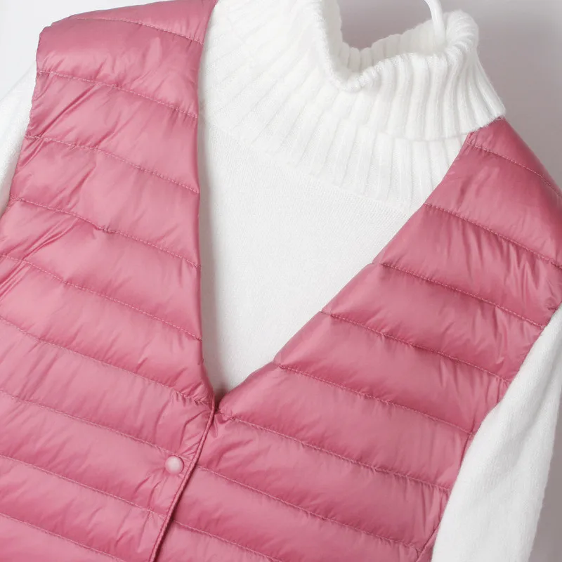 سترة نسائية لخريف وشتاء 2025 خفيفة للغاية بيضاء مبطنة للأسفل سترة نسائية طويلة أسفل صدرية معطف بدون أكمام ملابس خارجية سترات