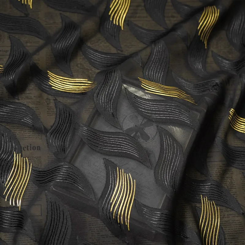 Soft Luxurious Black Chiffon Fabric with Intricate Gold Foil Cutouts - Ideal for Designer Clothing and Accessories By The Meter