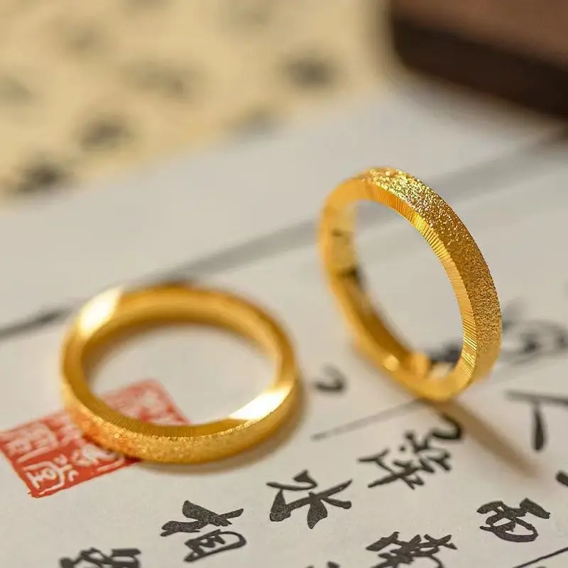 

4mm Flat Matte Couples Rings, 24K Gold, AU999 | "Hold" & "Hand" calligraphy engravings on matte gold, subtle romantic symbolism.