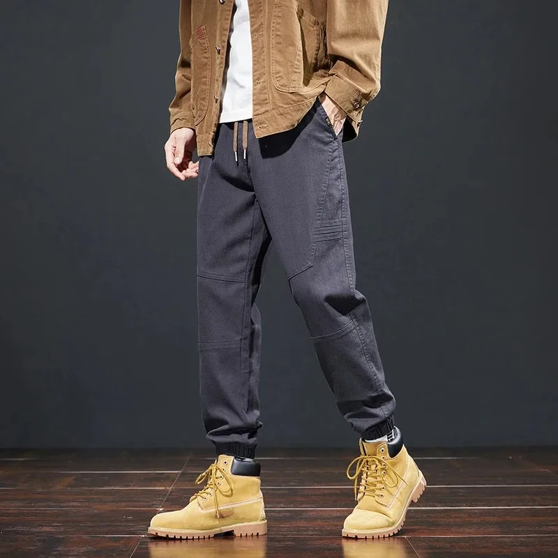 

Новые мужские повседневные брюки 2025 года, свободный крой, с глубокими манжетами, модные, длинные, для делового стиля, из хлопка и полиэстера...