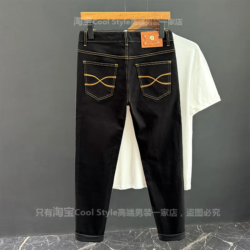 

High end jeans men's autumn slim fit small foot trendy brand light luxury 2026 new casual black long pants