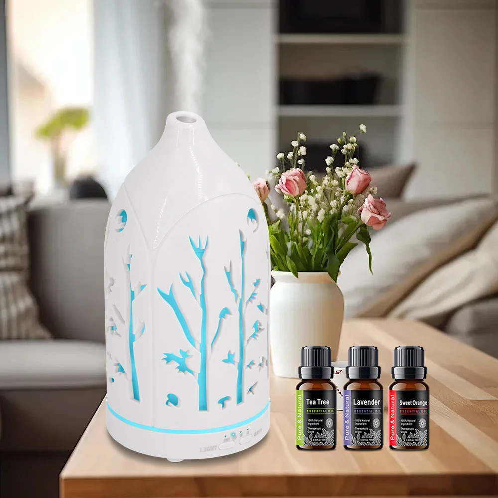 

7 Color Hollow Out Aromatherapy Diffuser Includes 3 Essential Oils, Auto Shut Off & Whisper Quiet Operation