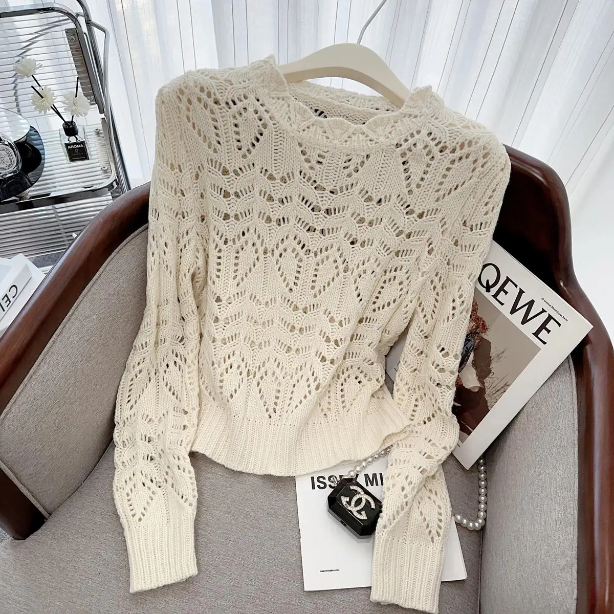 

2023 new women's wear European and American style fashionable handmade hollowed-out knitted sweater women's long-sleeved sexy sl