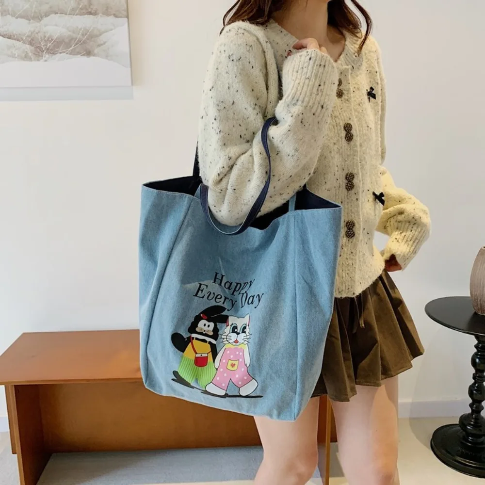Borsa tote bifacciale con animali dei cartoni animati Borsa a tracolla leggera Borsa blu denim Borsa versatile in tela da donna in poliestere Primavera