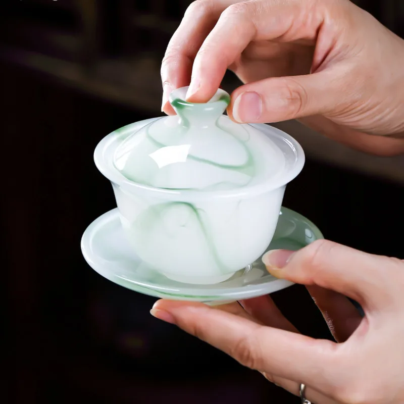 

Crystal Clear Jade Porcelain Tea Cup Set Handmade Three-Piece Cover Bowl Non-Hot Design Household Glass Kung Fu Tea Set