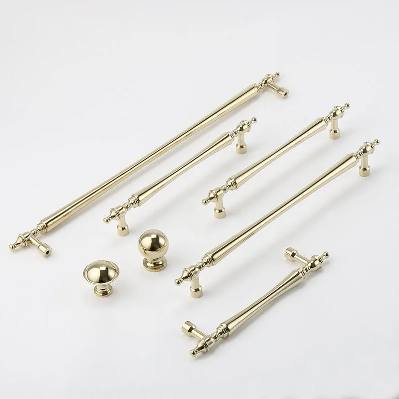Gold cabinet handles and knobs viewed from above