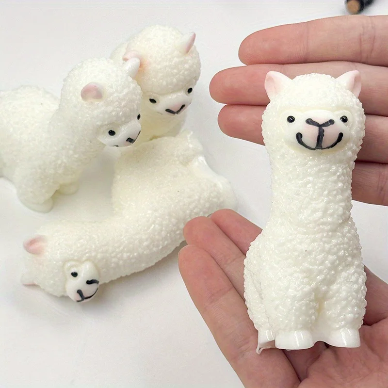 A Cartoon Little Sheep with Small White Ears, a White Short-Haired Goat, And a Lively Standing Goat Llama Squeeze Toy Made of Si
