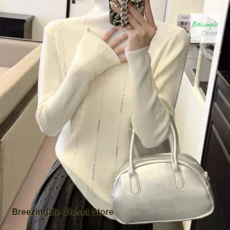 Korean high-necked rhinestone temperament sweater women's autumn and winter new fashion with bottoming sweater and slim top.
