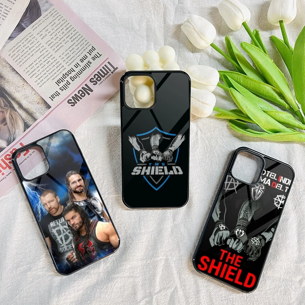 حافظة هاتف WWE The Shield لهاتف آيفون 16 15 14 13 12 11 Pro Max Mini 8 Plus Se Xr X Xs Fundas Shell PC + غطاء من البولي يوريثان