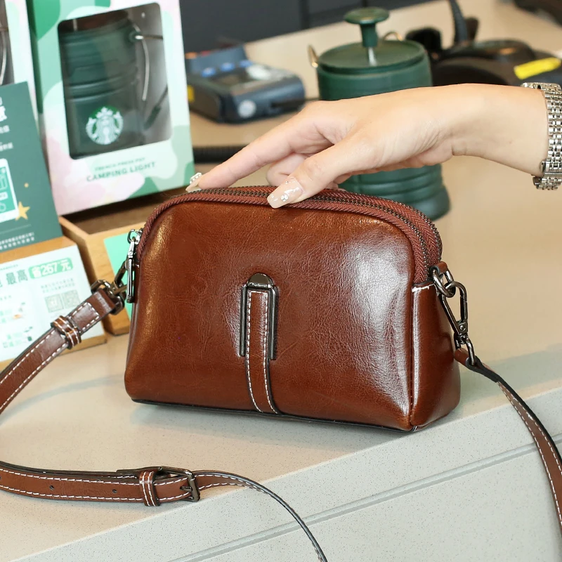 

Women's Genuine Leather Cowhide Bucket Bag Shoulder Crossbody Bag Vintage Handbag Crossbody luxury Designer commuting handbag
