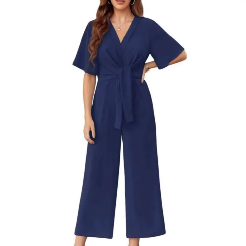 Sexy diepe v-hals chique rompertjes met veters voor dames nieuwe zomerstijl casual en elegant losse wijde pijpen vrouwelijke jumpsuit 2025