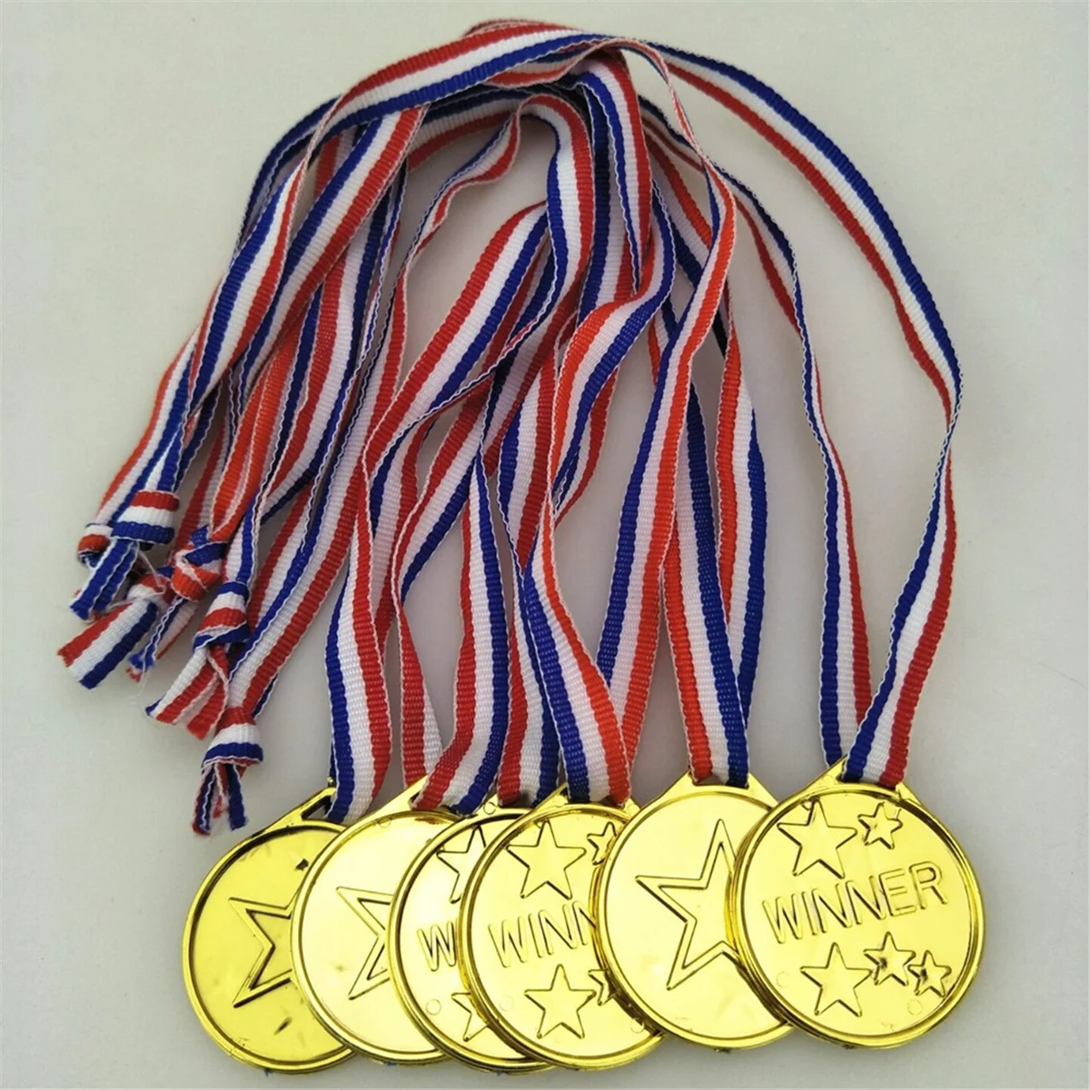 

NEW 30 Pack Gold Plastic Winner Medals Award Medals for Kids - Perfect for Sports, Competition and Party Favors