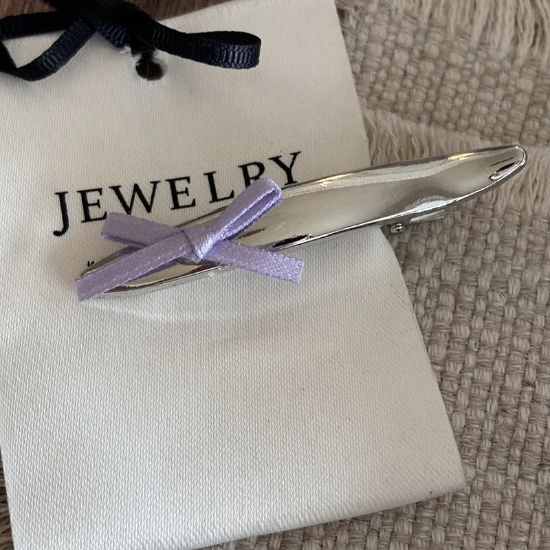 Silver bow metal hair clip women\'s ribbon new minimalist and niche design bangs clip hair accessory