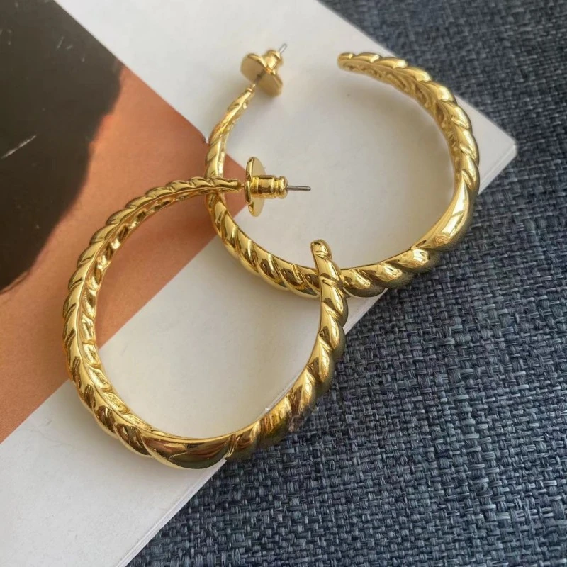 Bague en corne de vache, Design de Niche, spirale, Style froid, métal, laiton, motif torsadé, grandes boucles d'oreilles