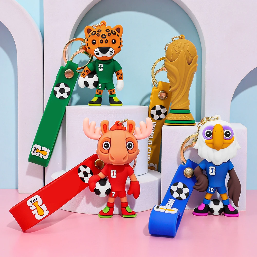 2026 Nuovo calcio IP mascotte squadra di calcio figura in PVC borsa fascino partita di calcio portachiavi souvenir per bambini e fan di Natale
