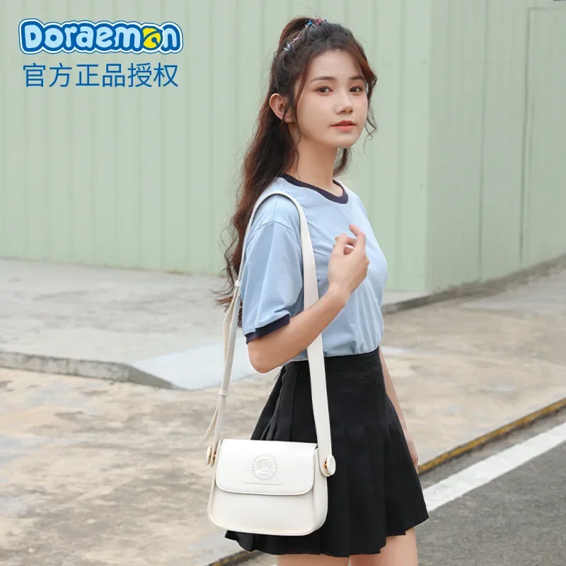 Doraemon-monederos y bolsos de moda sencillos para mujer, bolso de mensajero para mujer, bolso cruzado de un hombro para niñas, bolsos estampados