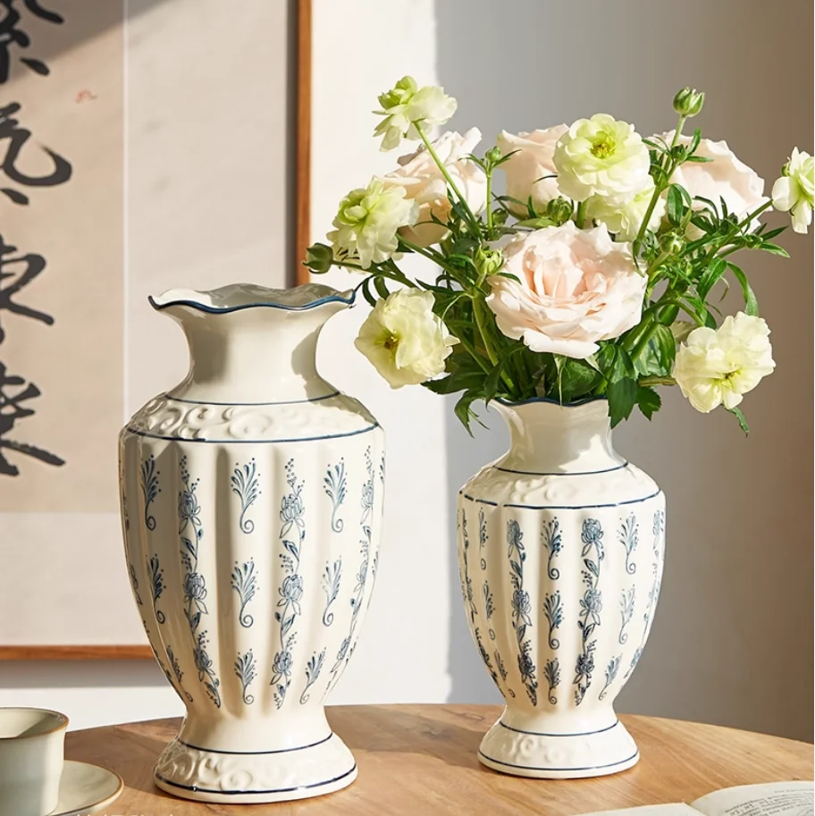 

Retro ceramic vase with white carved patterns for hydroponic floral arrangement, a decorative piece for living room decor