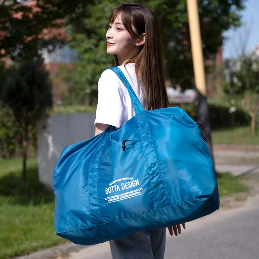 

‌Flight-Ready Foldable Travel Duffel Storage Bag - Packable Carry-on Luggage For Weekend Trips Lightweight & Water-Resistant