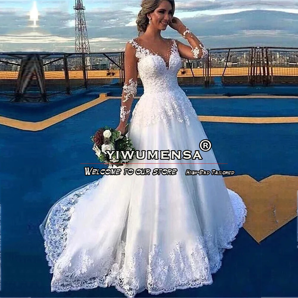 Illusion Tulle A Line Wedding Dresses Crystals Beaded Bridal Gown Long Sleeves O Neck Buttons Back Design Women Party Clothes