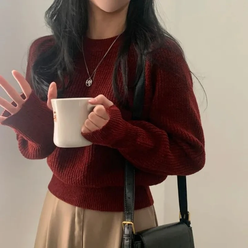 เสื้อไหมพรมถักทรงหลวมสไตล์วินเทจสำหรับผู้หญิง แขนยาว คอกลม สีพื้น สไตล์เกาหลี ลำลอง ประจำฤดูใบไม้ร่วงและฤดูหนาว ปี 2025