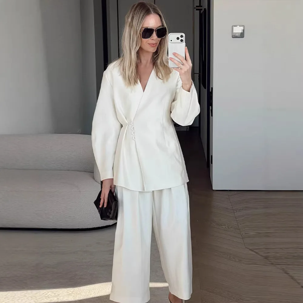 

Minimalist Summer Women's Suit With An Elegant Luxurious Vibe, Featuring A V-Neck Side-Button Waist-Cinching Top And Flowy