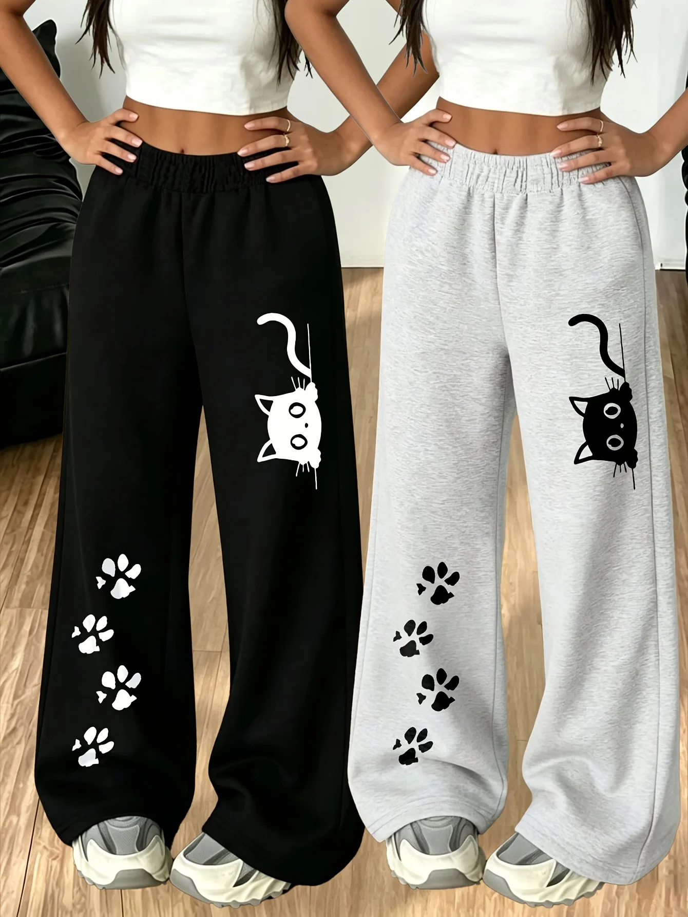 2-Pack Girls' Athletic Pants featuring cute cat and paw prints; made from soft material, these versatile pants are perfect for c