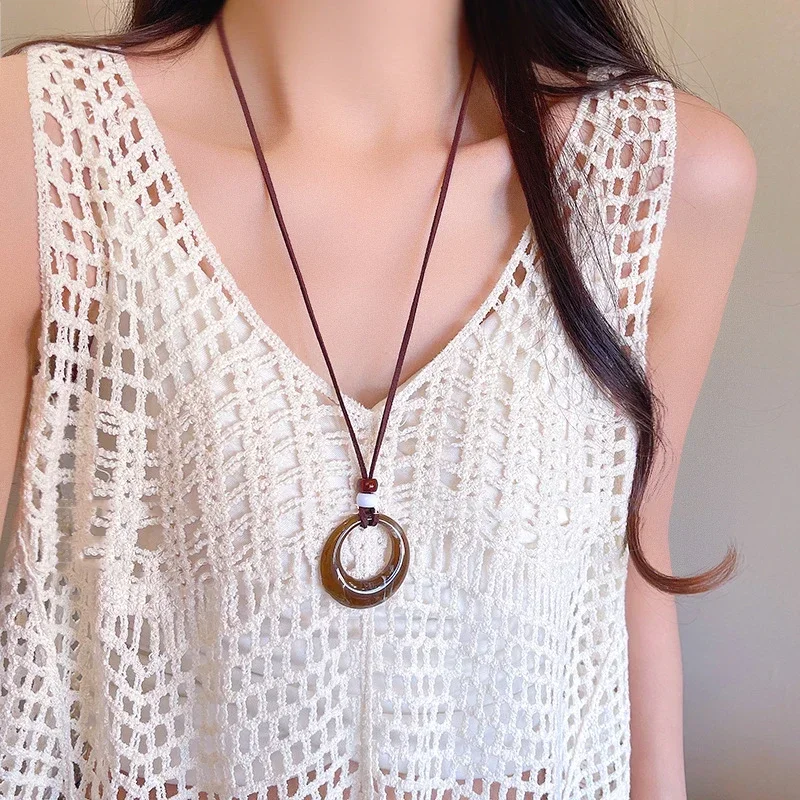 العرقية نمط الرجعية الراتنج التعميم هندسية قلادة طويلة قلادة المرأة الخريف والشتاء موضة سترة سلسلة مجوهرات