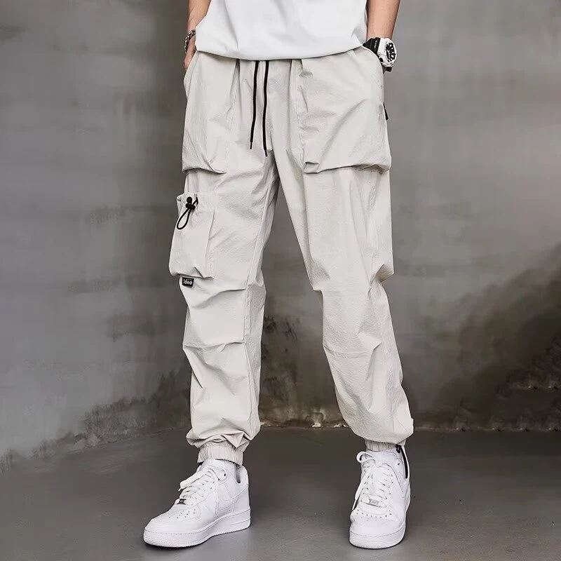 Pantalones Cargo de cintura elástica para hombre, ropa de calle informal, pantalones de Joggers con bolsillo, moda coreana, primavera y otoño