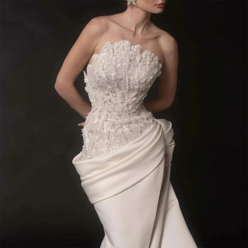 White Lace Beads Applique Strapless Mermaid Bridal Gown With Draped Train Irregular Neck And Big Bow Skirt