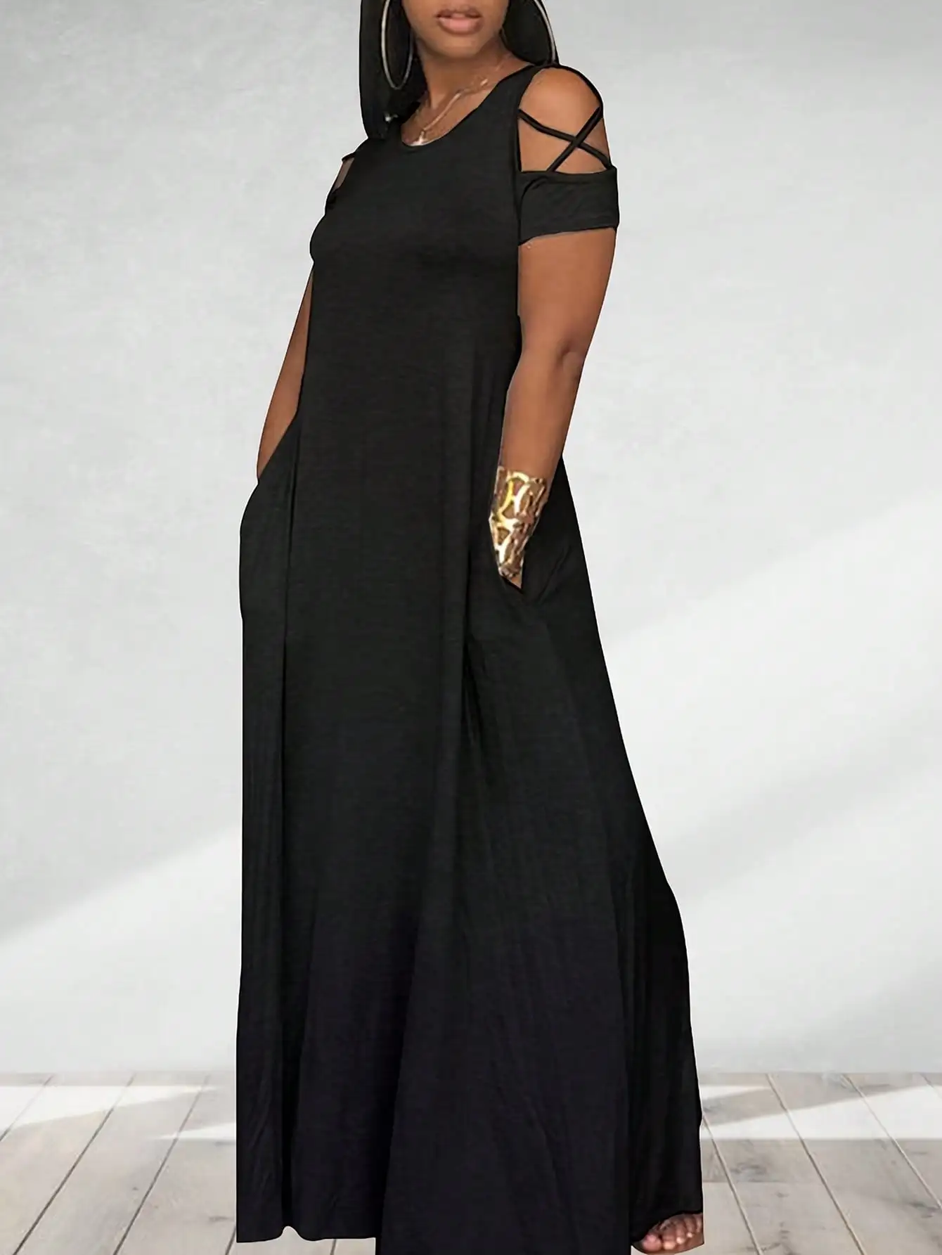 

Plus Size Black Off-Shoulder Maxi Dress with Crisscross Straps and Side Pockets