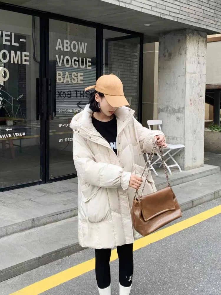 Chaqueta con capucha de plumón de pato blanco para mujer, abrigo cálido de invierno, abrigo Parker de sección larga, temperamento de calle