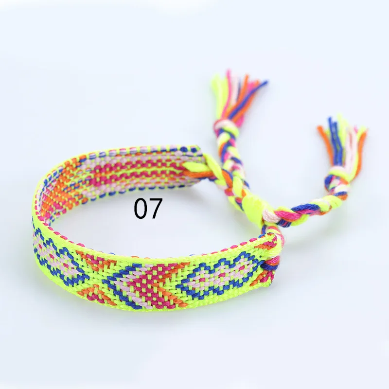 Single Nepal woven friendship bracelet with adjustable sliding buckle, suitable for beach vacation, wearing a drawstring