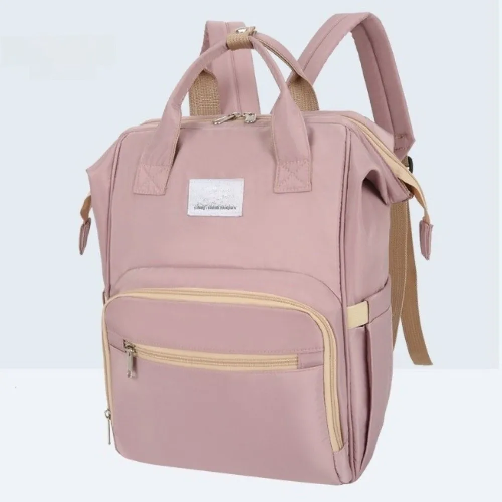 حقيبة الأم المحمولة ذات سعة كبيرة ومتعددة الوظائف حقيبة ظهر للحفاضات قابلة للطي وخفيفة الوزن وحقيبة ظهر لحفاضات الأطفال للسفر