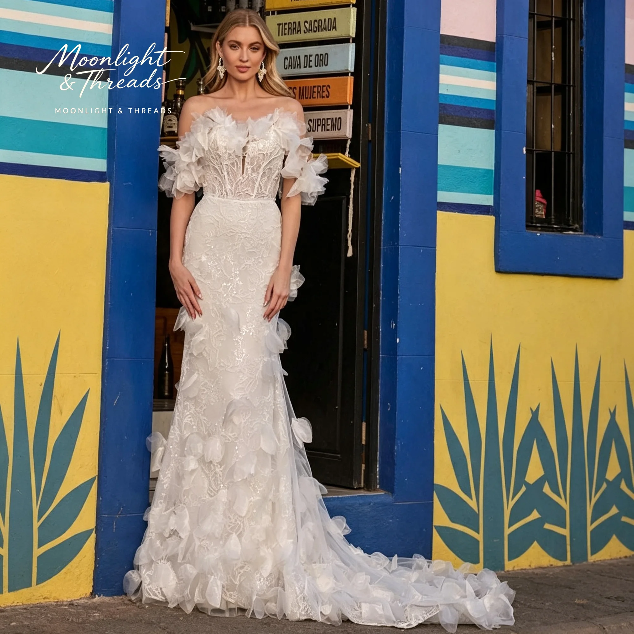 Elegant white mermaid wedding dress with exposed shoulders 3D floral appliqués and fishbone waistband for the bride view 3