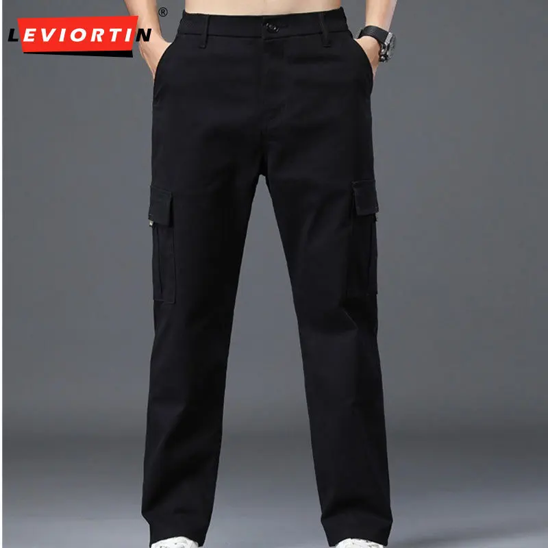 Four Seasons ใหม่ผ้าฝ้ายยืดกางเกงทํางานผู้ชายหลวมตรงเอวยางยืดสบายๆหลายกระเป๋ากางเกง