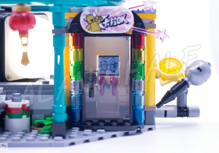 2187pcs Monkie Kid City of Lanterns Lotus Hotels Panda Shops Transit Train 86999 Building Blocks Toys Compatible With Model