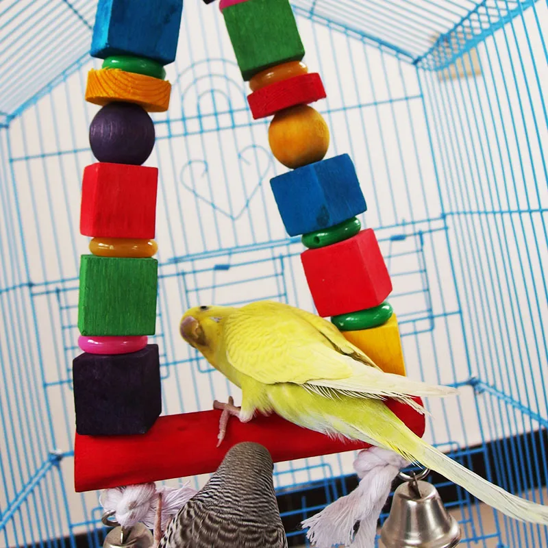 Parrot toy supplies, colored bird toys, parrot nibbling, standing, grinding mouth and teeth toys