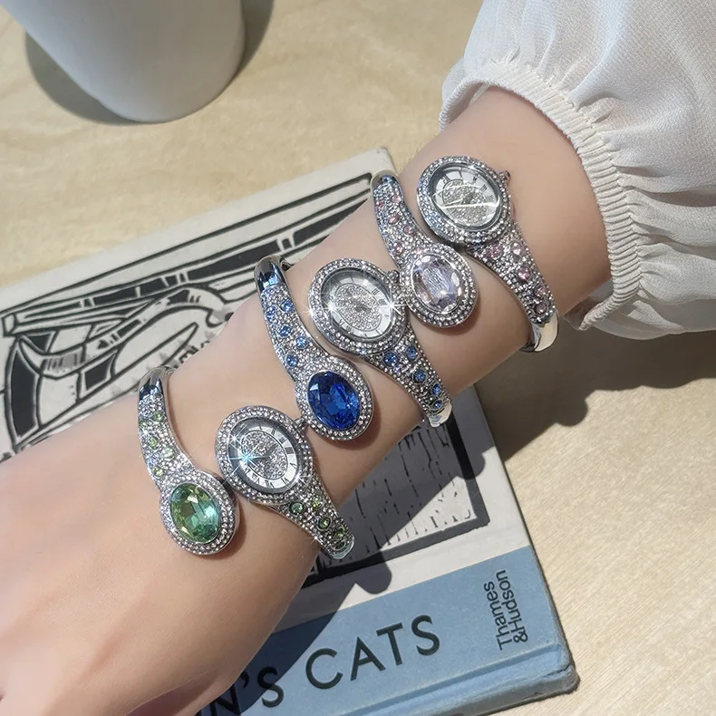 Women's diamond bracelet watch with sparkling oval egg-shaped gemstone, delicate snake-style women's watch ...